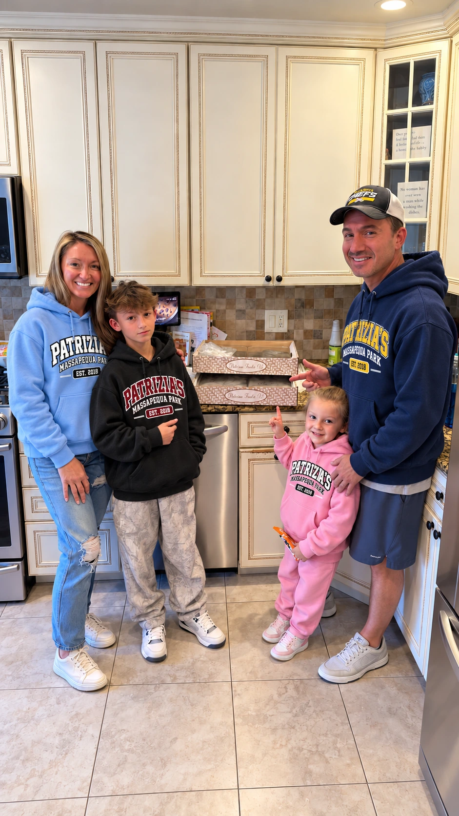 Our first Parents’ Corner winning family celebrating their meal together in Patrizia’s hoodies